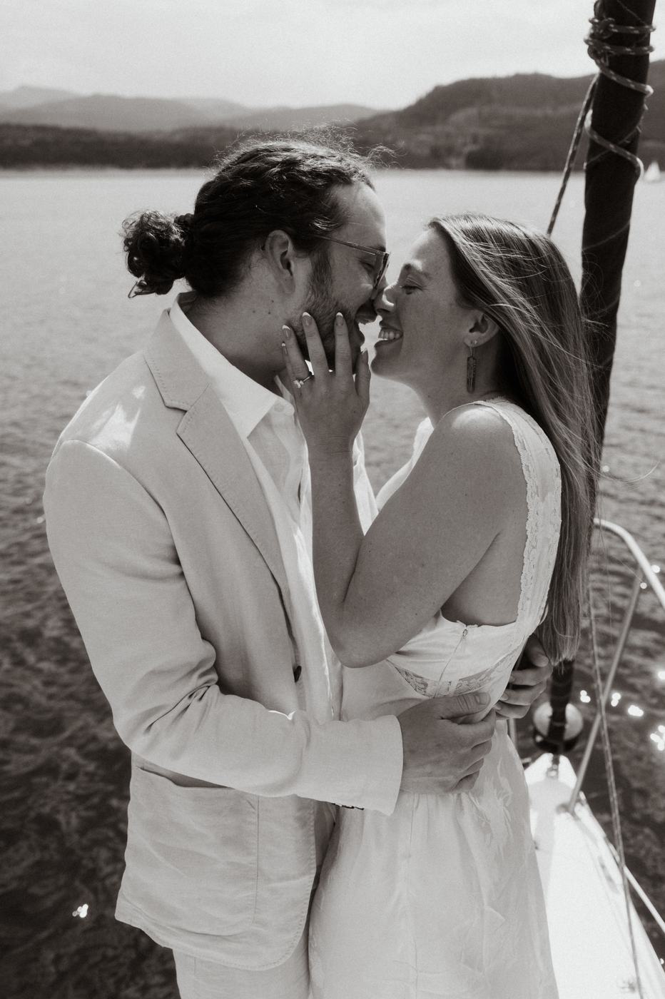 Black and white kiss on the sailboat