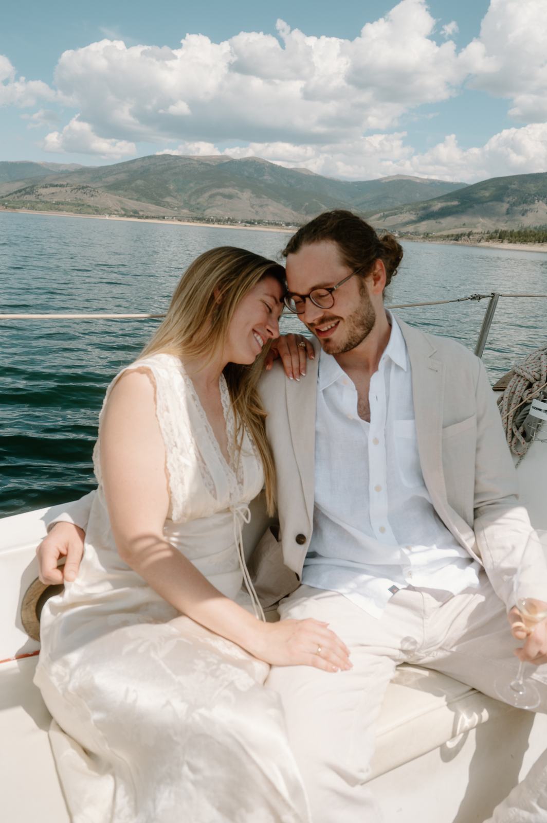 Lauren and Christopher laughing together on the deck